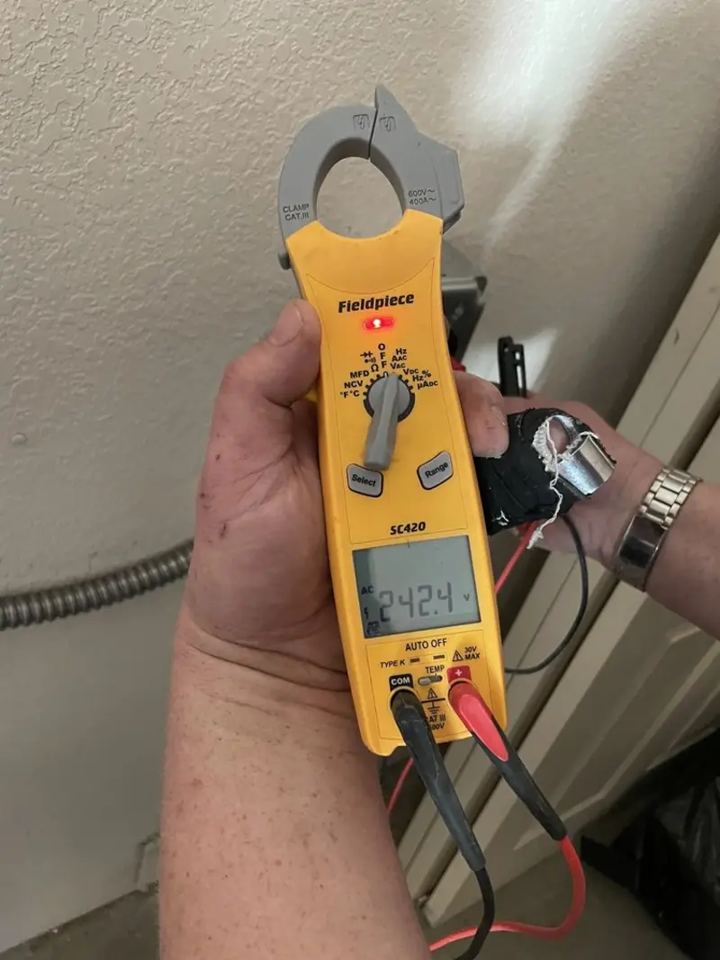 Voltage testing with clamp meter during Generator Installation in Cary